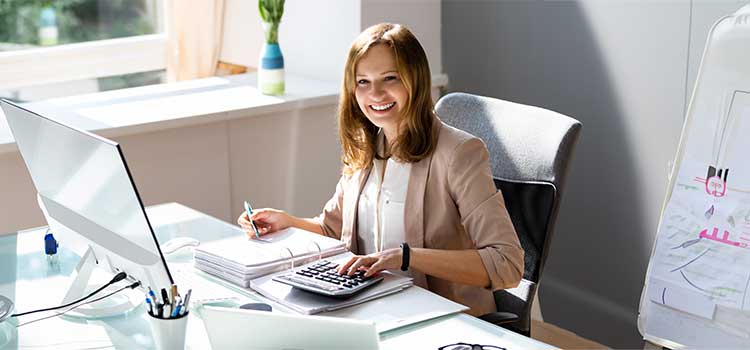 accountant with associate degree doing entry level work at desk