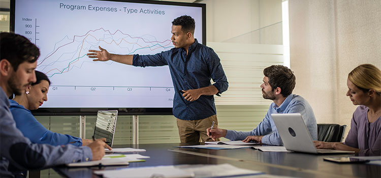 accountant showing financials to team