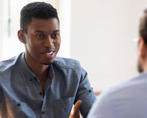 man interviews for job with hr specialist